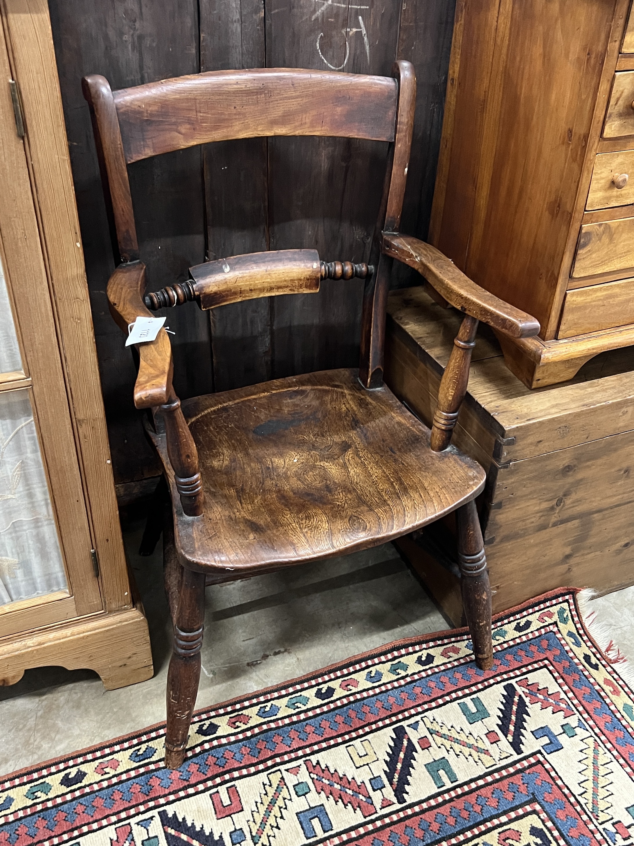 A Victorian elm and beech Windsor elbow chair, width 52cm, depth 40cm, height 87cm